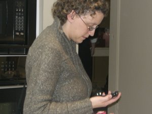 Nathalie checks Blackberry ON A BREAK!
